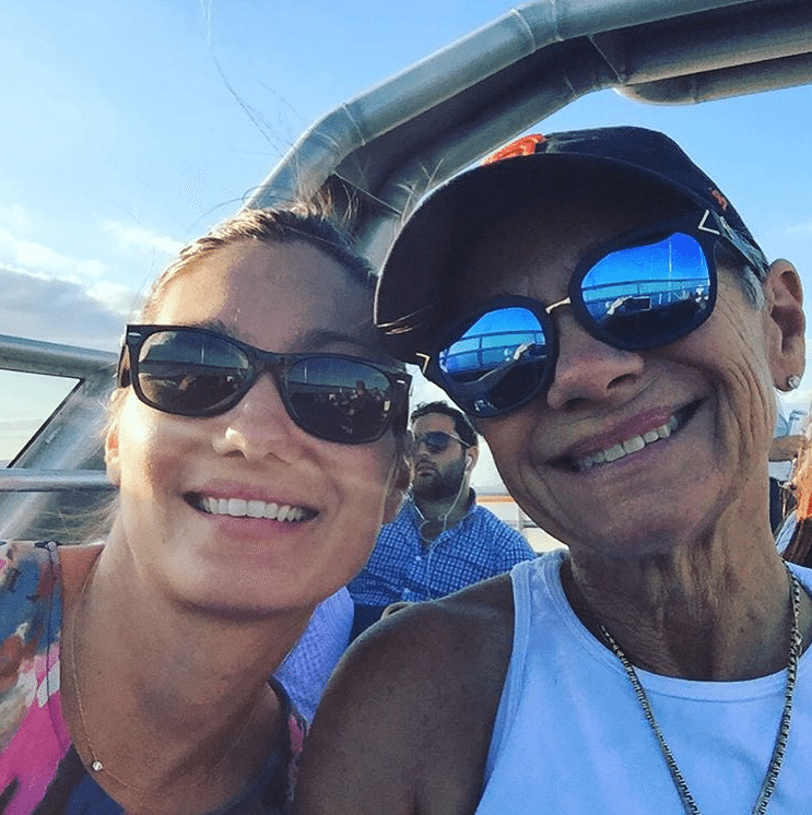 Passengers taking a selfie on the top deck