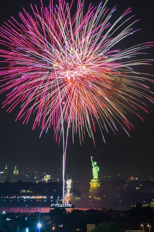 Fireworks with the Statue of Liberty in New York, USA