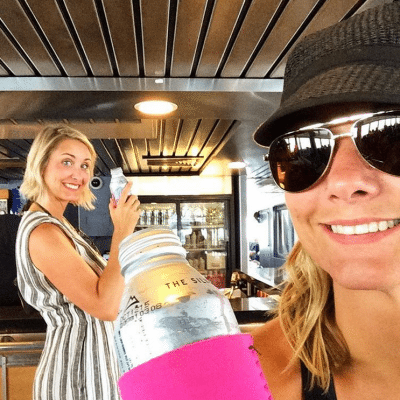 Women inside the ferry with beverages