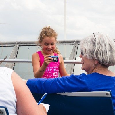 Family enjoys time on the top deck of the Seastreak ferry